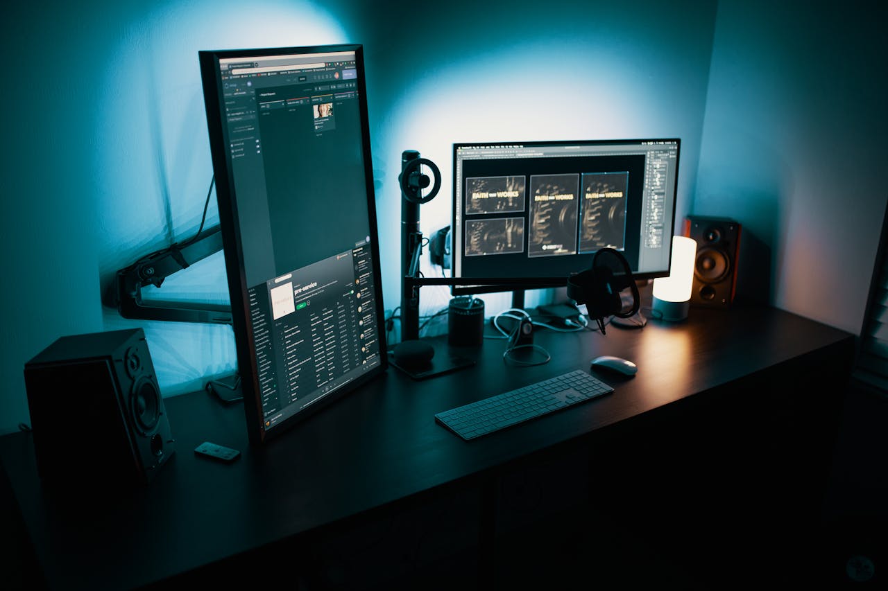 about-img A contemporary office desk featuring a dual monitor setup with stylish lighting, ideal for tech enthusiasts.