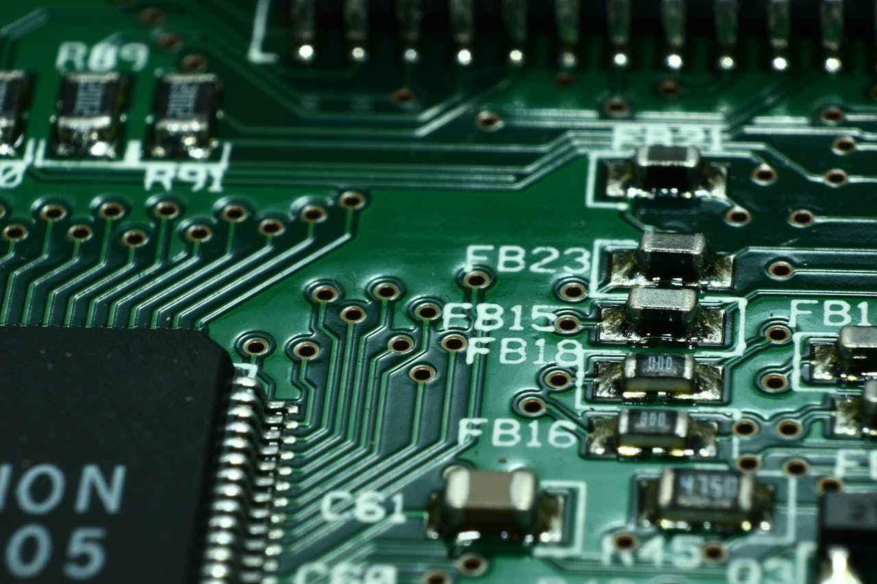 gallery-4 Detailed macro view of a circuit board showcasing microchips and electronic components.